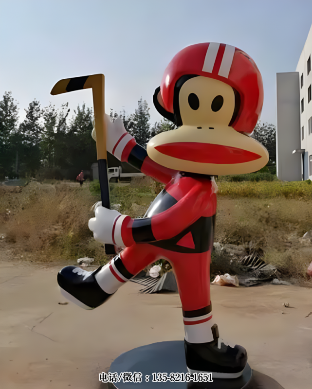 打冰球的卡通猴子雕塑 打冰球的卡通猴子雕塑