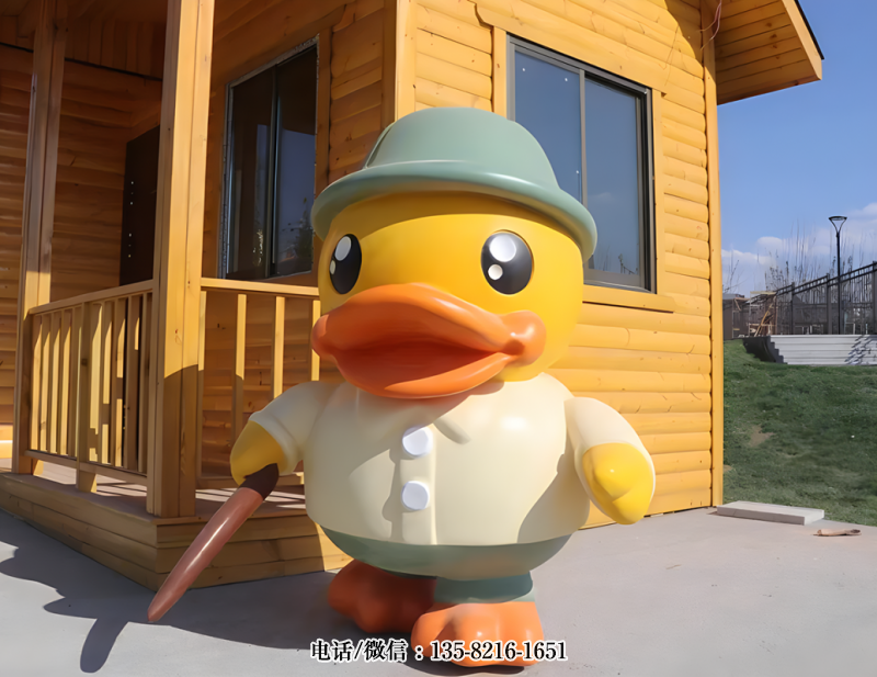 手持拐棍的卡通鴨子雕塑 手持拐棍的卡通鴨子雕塑