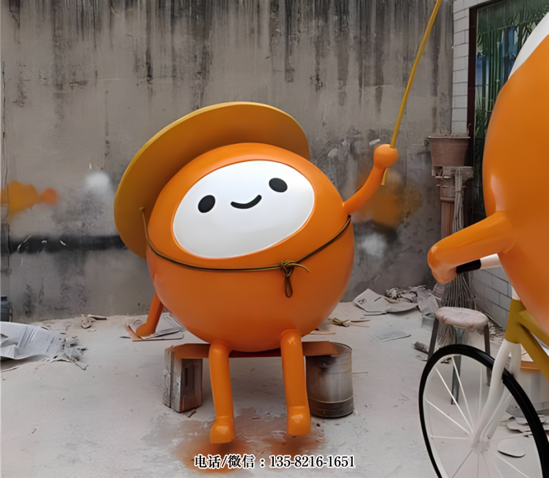 戴草帽釣魚的卡通柑橘公仔 戴草帽釣魚的卡通柑橘公仔